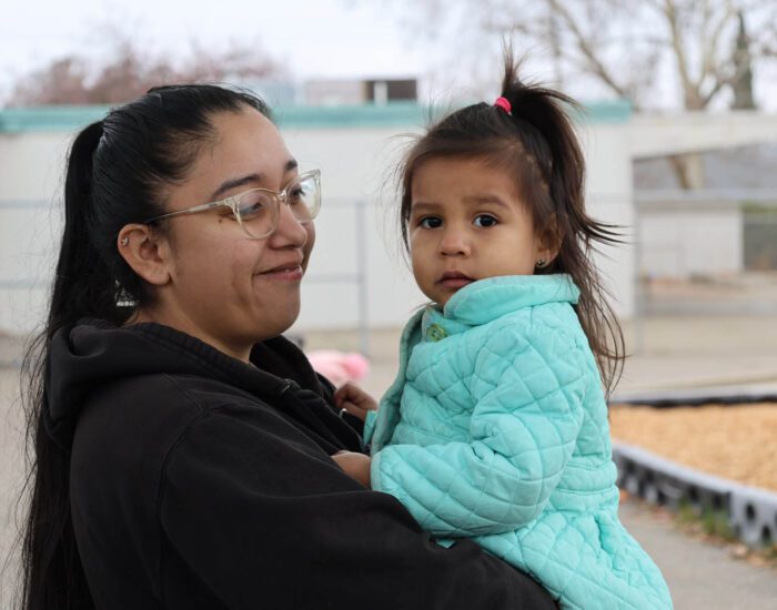 Mother holding her child